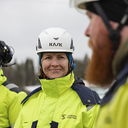 Porträtt på Ida Wallentin ute i fält.